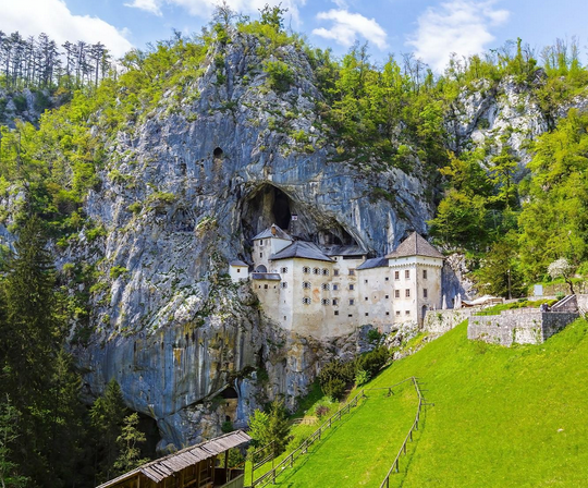 https://bestbtransfer.si/wp-content/uploads/2025/11/Postojna-Cave-Predjama-Castle.png